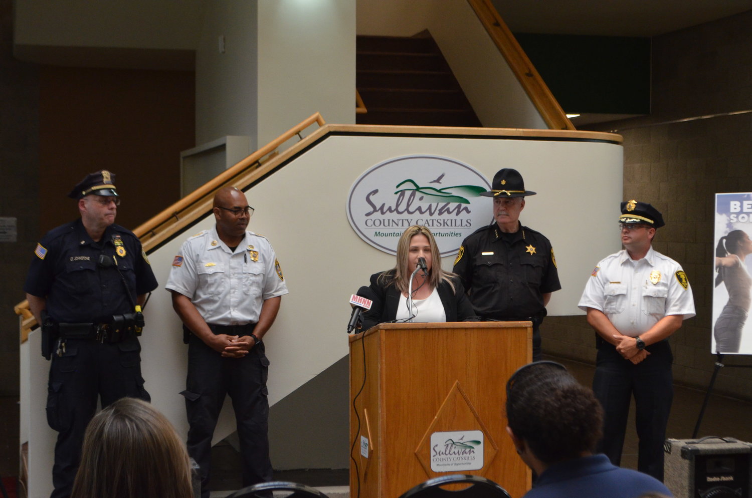 Sullivan County District Attorney Meagan Galligan describes the path to treatment offered by Hope Not Handcuffs, flanked by members of Sullivan County Law Enforcement.
